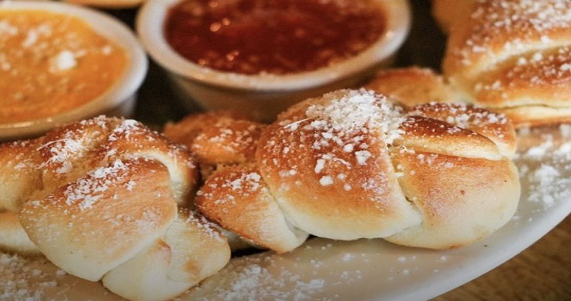 Garlic knots with dipping sauces